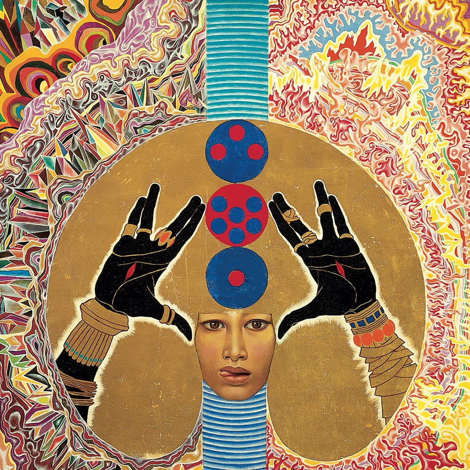 an artwork of a woman's face surrounded by gold and patterns, with her hands up in a gesture with her fingers separated